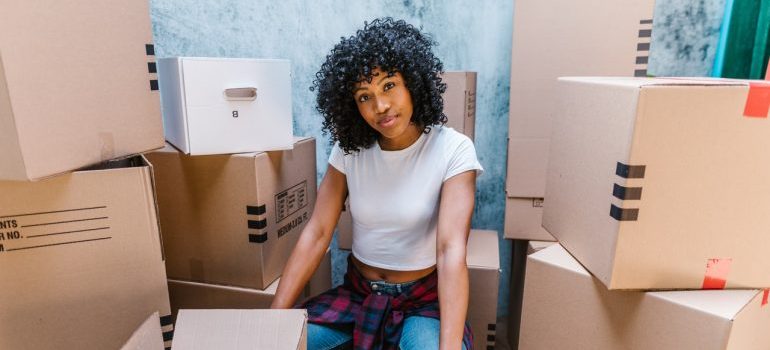 Packing boxes to declutter your new home after moving from Bethesda to Ashburn