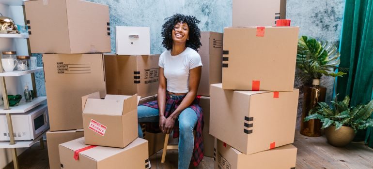 woman happy because she found a complete guide on moving to Alexandria VA