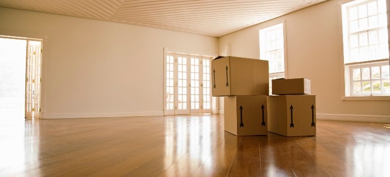 stacked boxes in an empty room