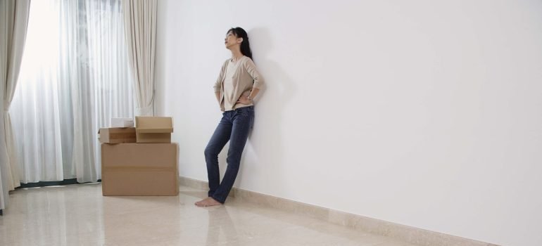 woman standing in an empty room